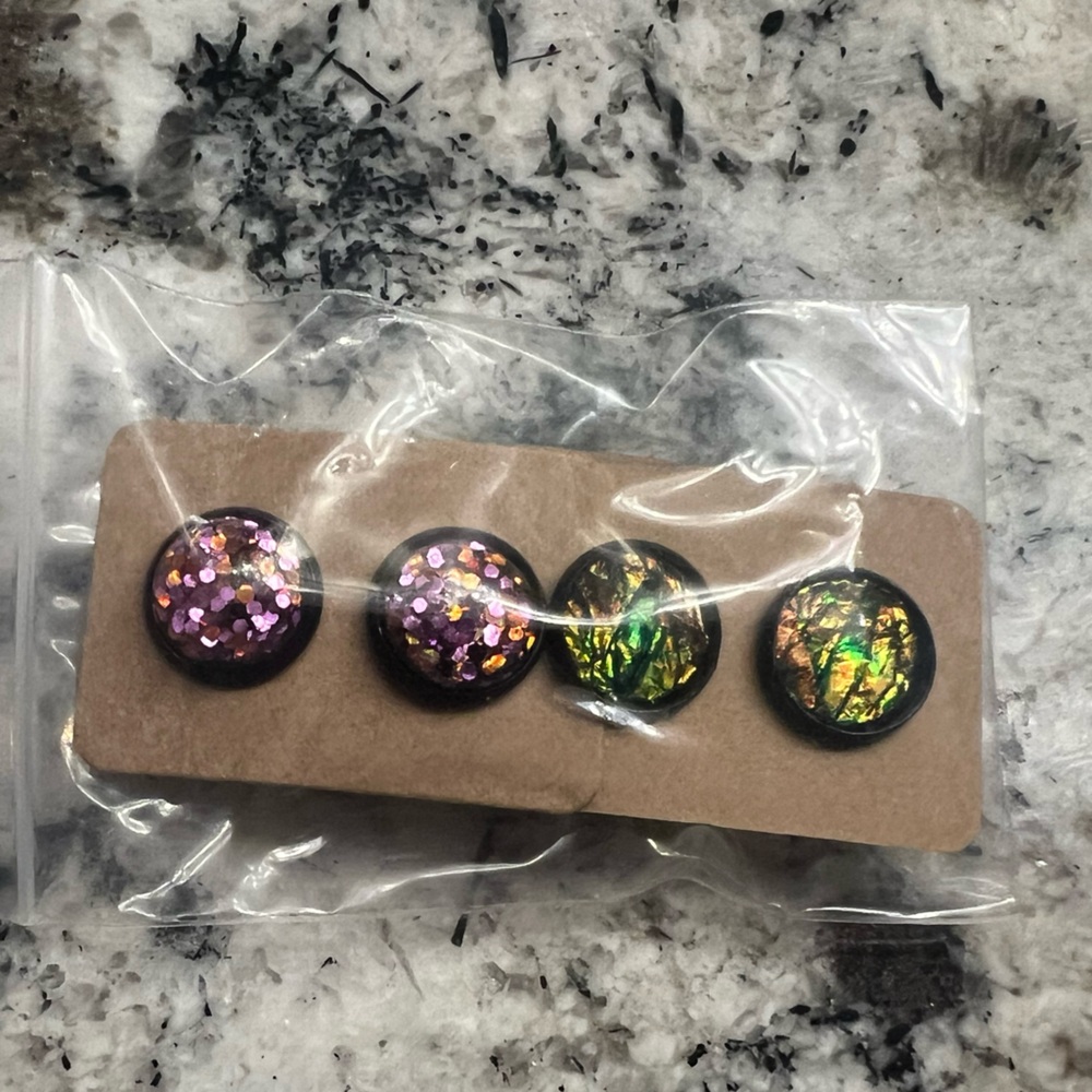 Purple and green stud earrings